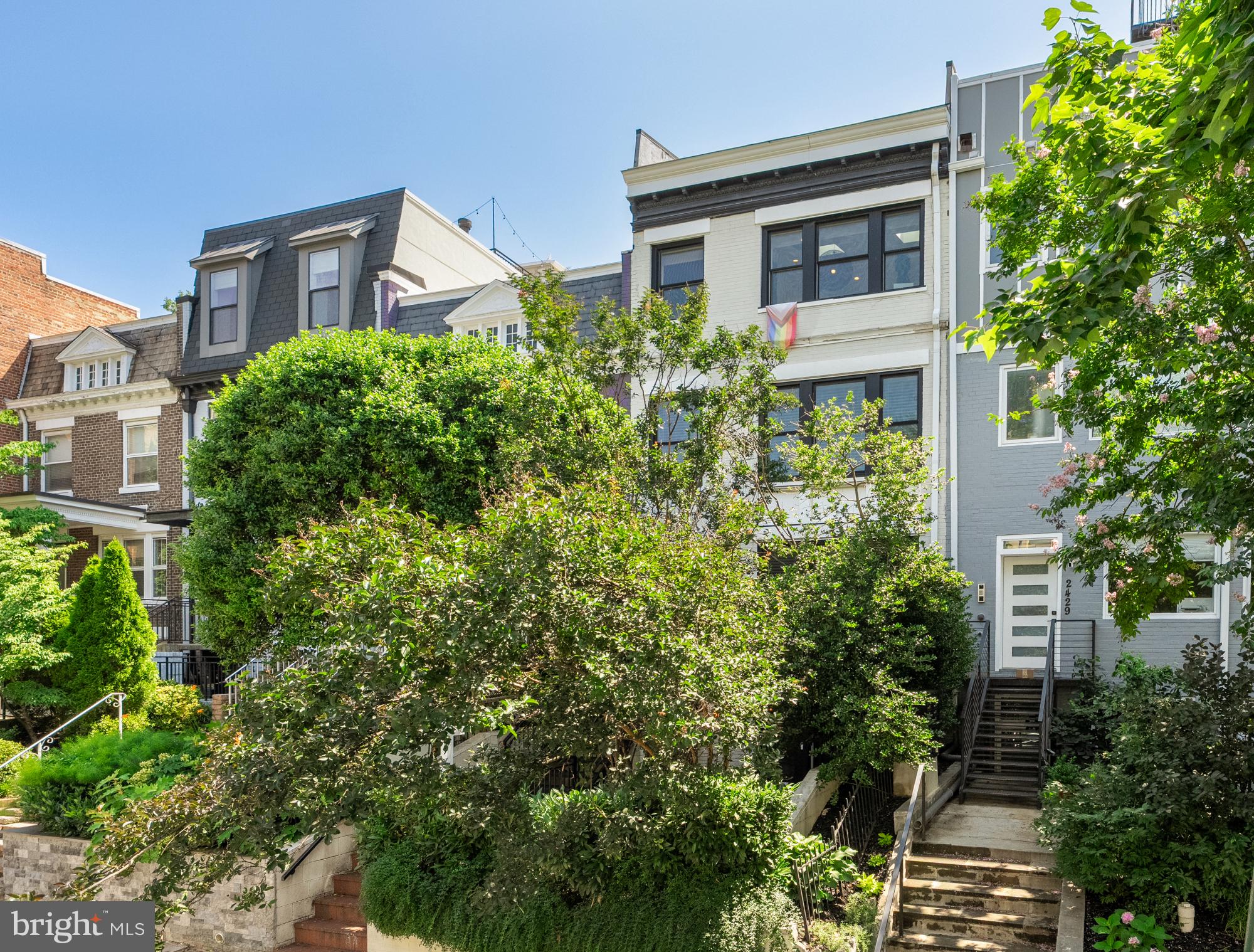2431 Ontario Road Northwest, Unit 4 Washington, DC 20009 - Photo 2 of 48 a front view of a house with a yard