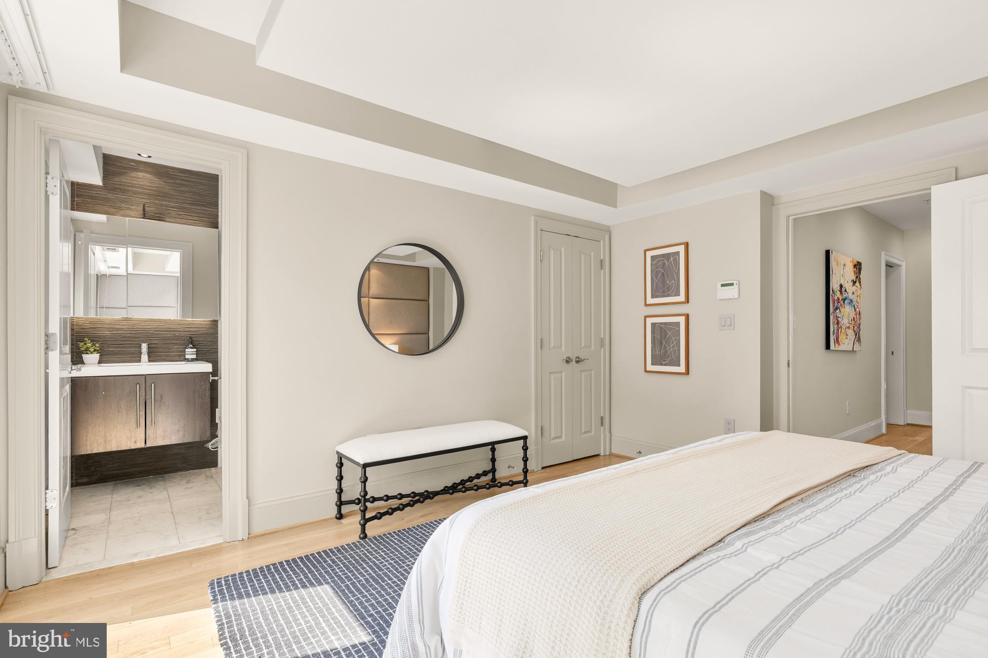 2431 Ontario Road Northwest, Unit 4 Washington, DC 20009 - Photo 23 of 48 a bedroom with bed and a window