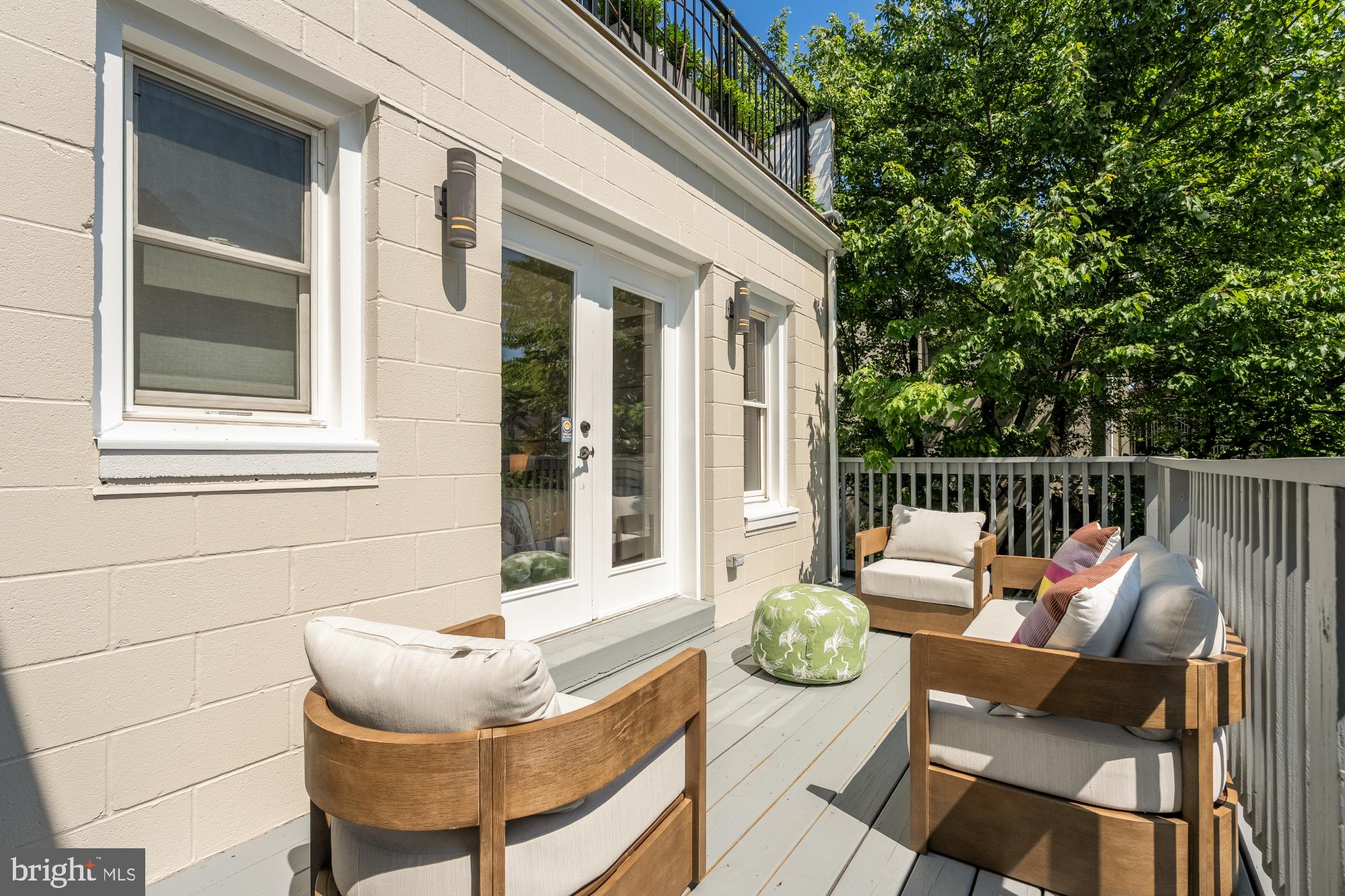 2431 Ontario Road Northwest, Unit 4 Washington, DC 20009 - Photo 27 of 48 a outdoor living space with furniture and garden view