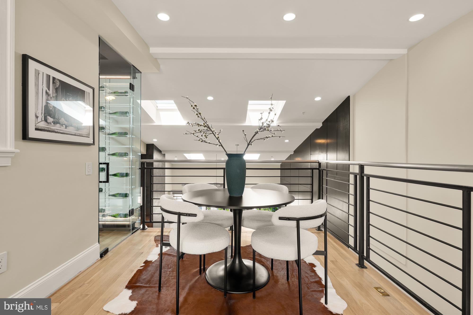 2431 Ontario Road Northwest, Unit 4 Washington, DC 20009 - Photo 30 of 48 a view of entryway and hall with wooden floor