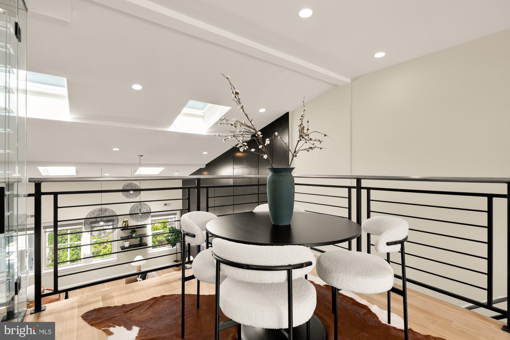 2431 Ontario Road Northwest, Unit 4 Washington, DC 20009 - Photo 33 of 48 a room with furniture and a window