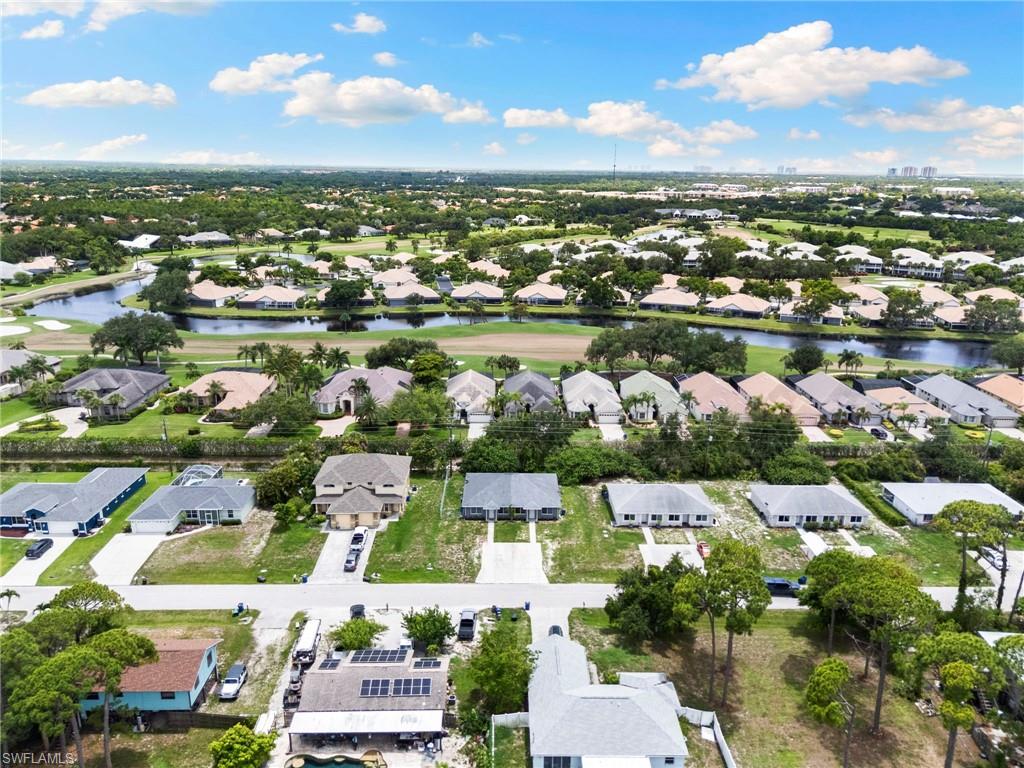 8264-8268 Matanzas Road Fort Myers, FL 33967 - Photo 33 of 33 an aerial view of lake and residential houses with outdoor space