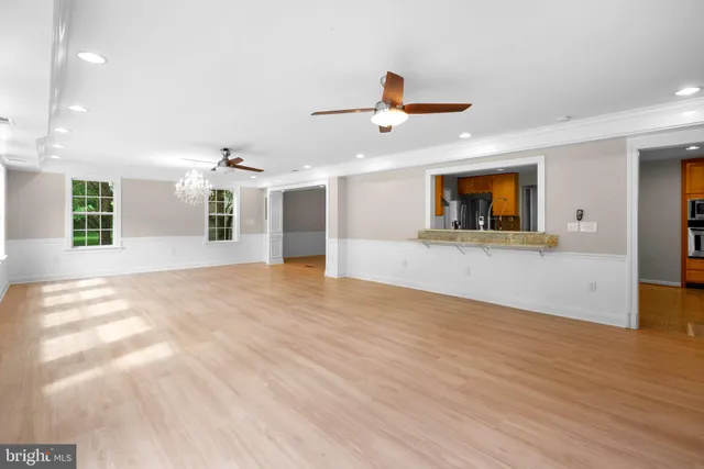 a view of a kitchen with a sink and a microwave