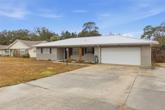 a very nice looking house with a large pool