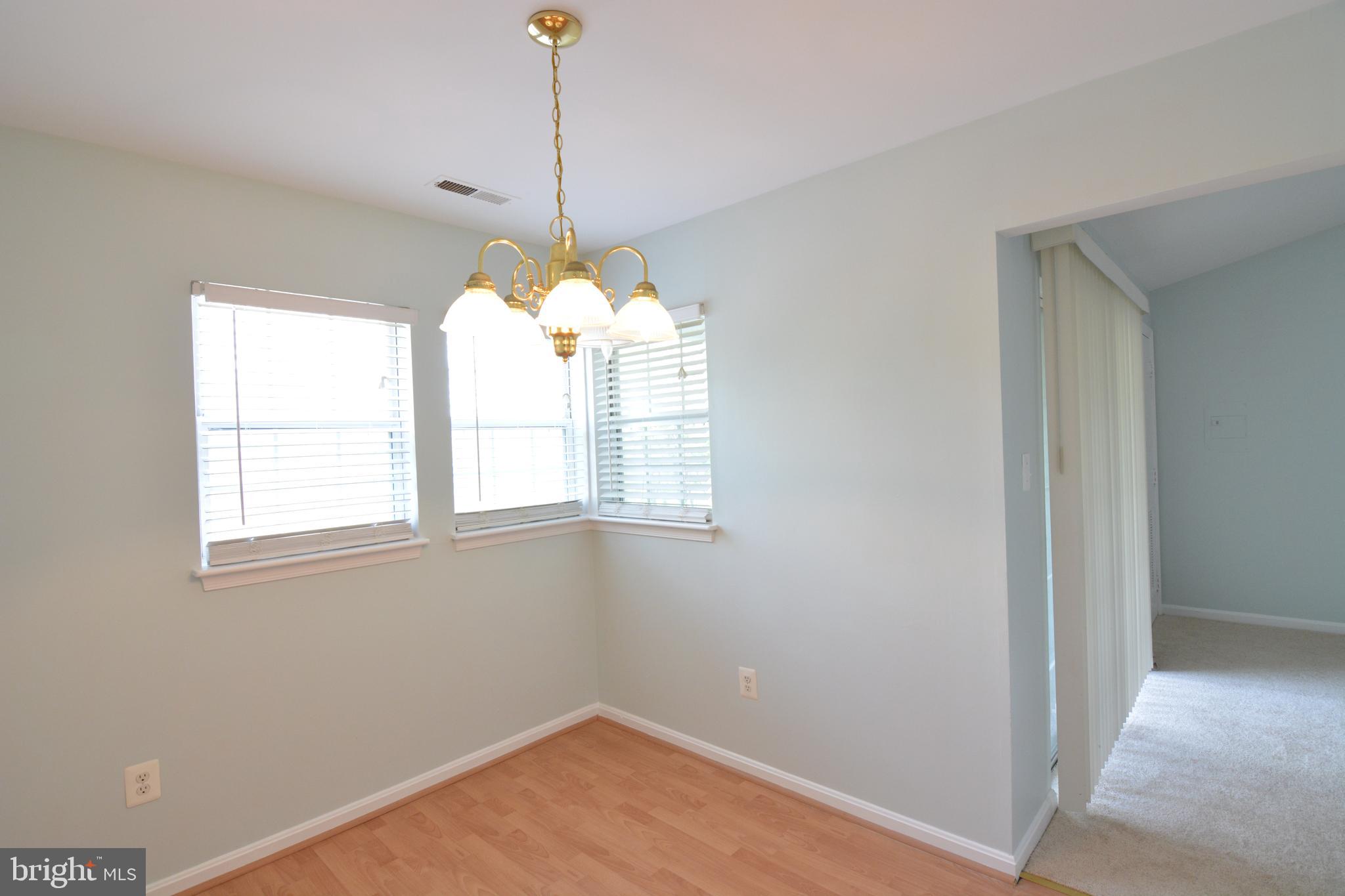 8352 Montgomery Run Road, Unit I Ellicott City, MD 21043 - Photo 12 of 38 Dining Room