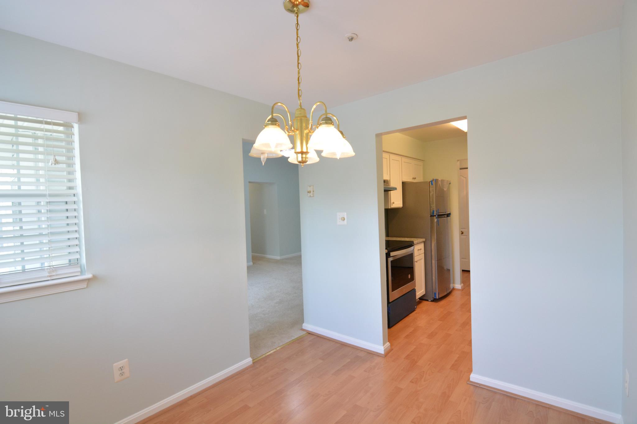 8352 Montgomery Run Road, Unit I Ellicott City, MD 21043 - Photo 13 of 38 Dining Room