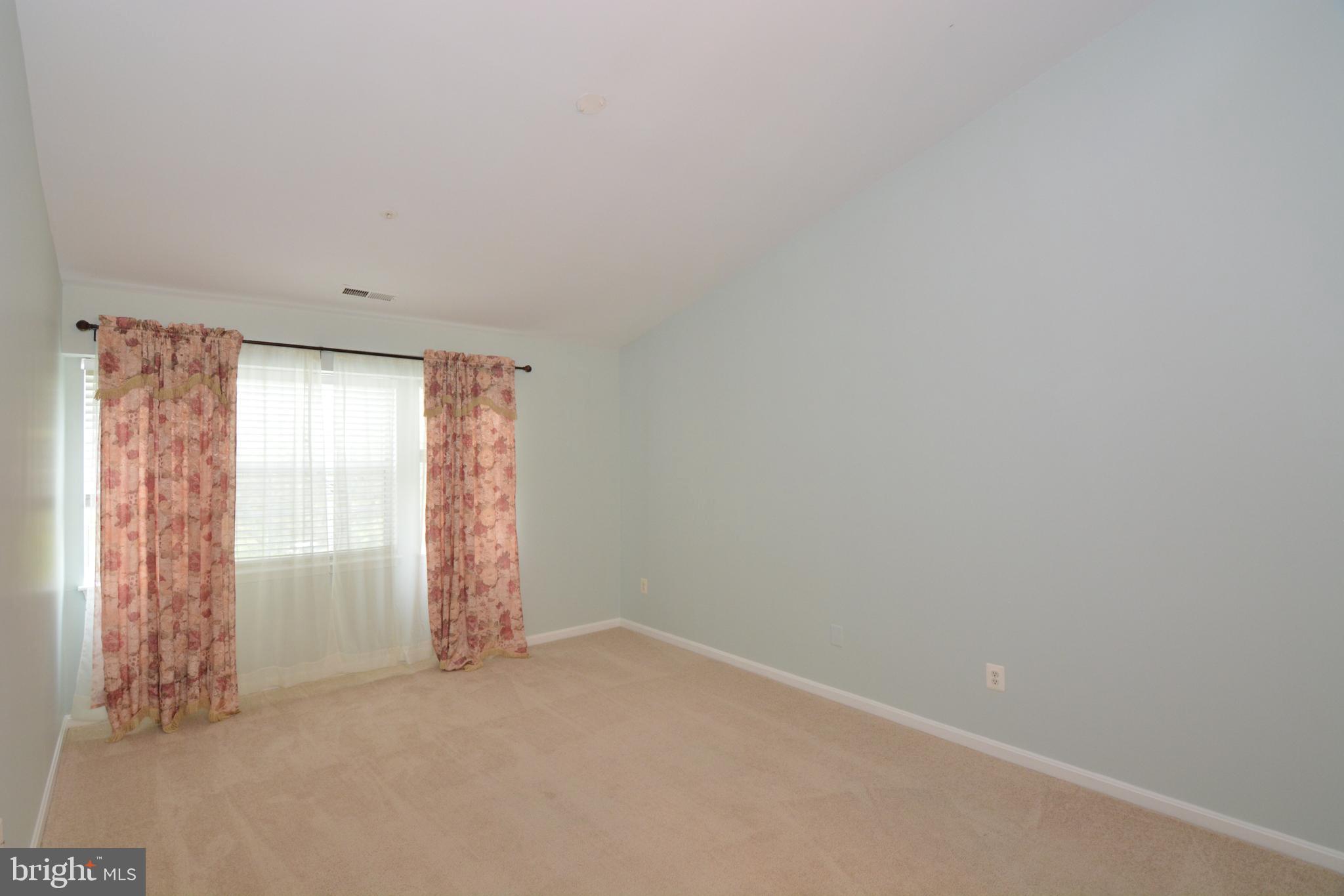 8352 Montgomery Run Road, Unit I Ellicott City, MD 21043 - Photo 23 of 38 Master Bedroom