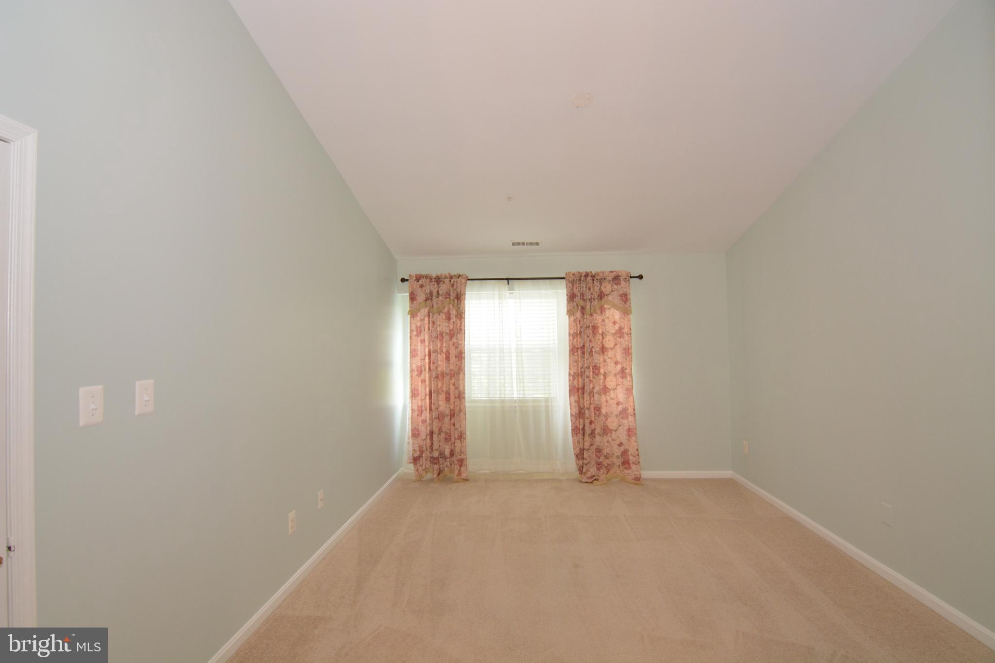 8352 Montgomery Run Road, Unit I Ellicott City, MD 21043 - Photo 25 of 38 Master Bedroom