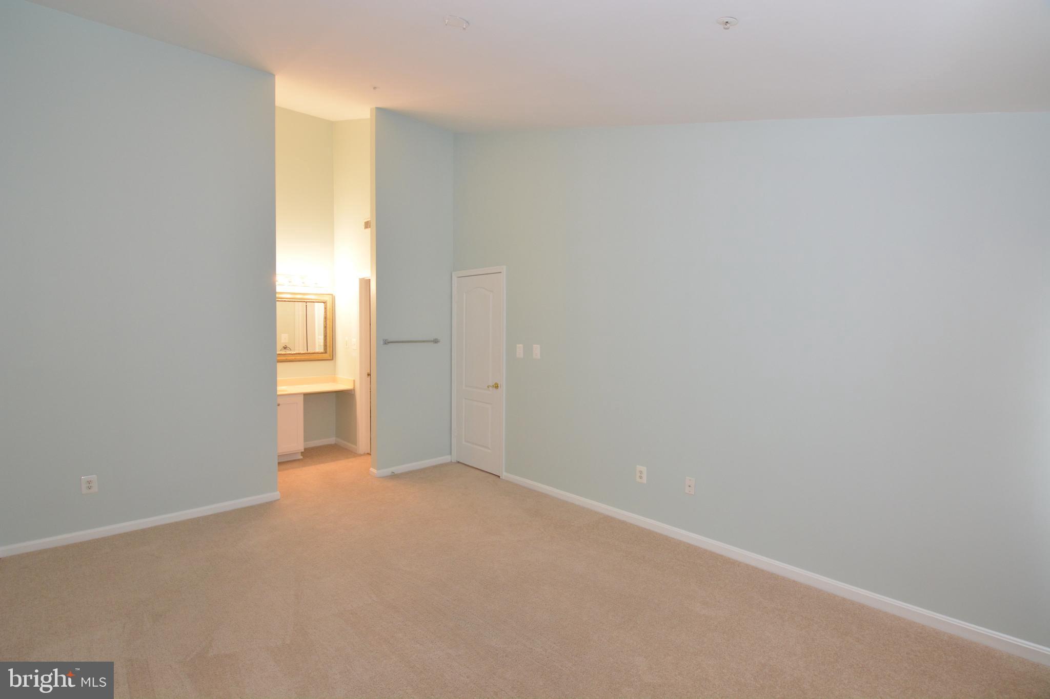 8352 Montgomery Run Road, Unit I Ellicott City, MD 21043 - Photo 27 of 38 Master Bedroom