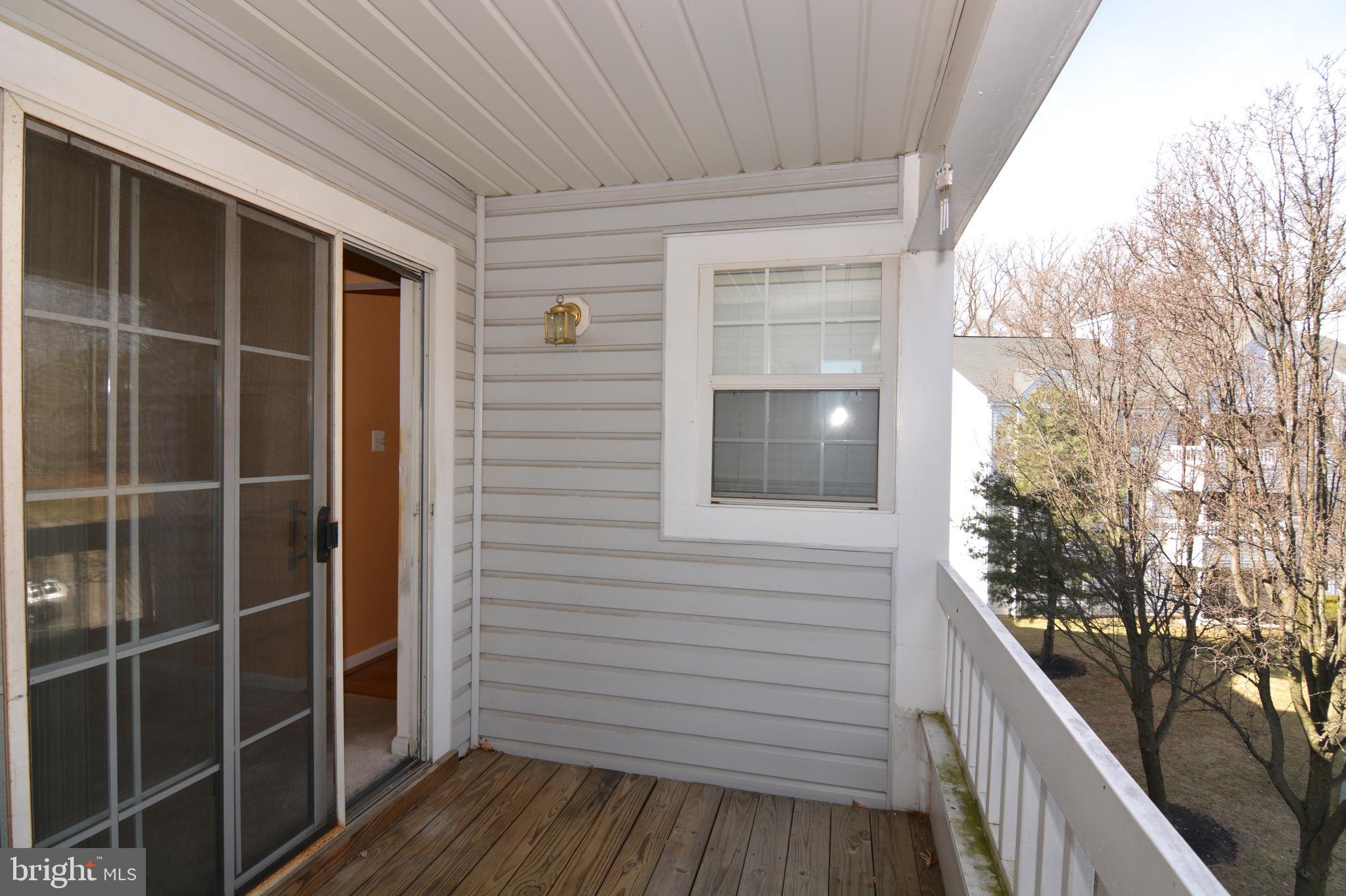 8352 Montgomery Run Road, Unit I Ellicott City, MD 21043 - Photo 37 of 38 Balcony over looks open area