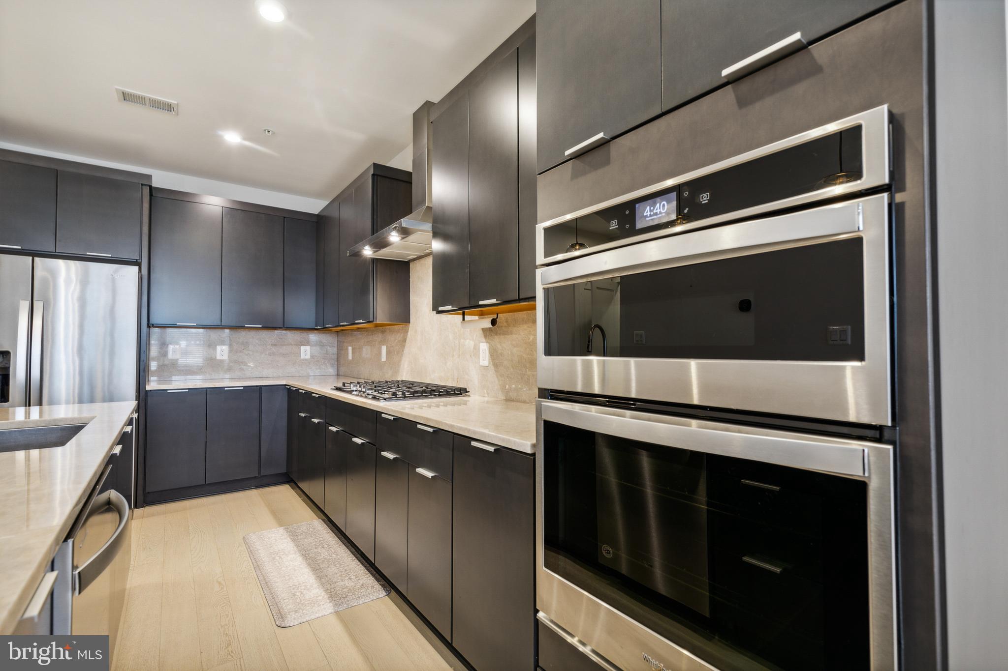 22318 Roanoke Rise Terrace Ashburn, VA 20148 - Photo 8 of 25 Built In Microwave & Oven