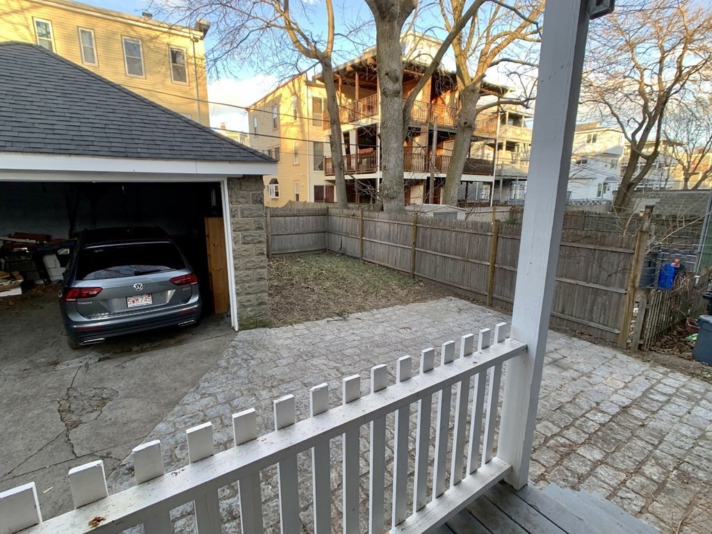 12 Rosemary Street, Unit 1 Boston, MA 02130 - Photo 17 of 17 a view of a house and car parked