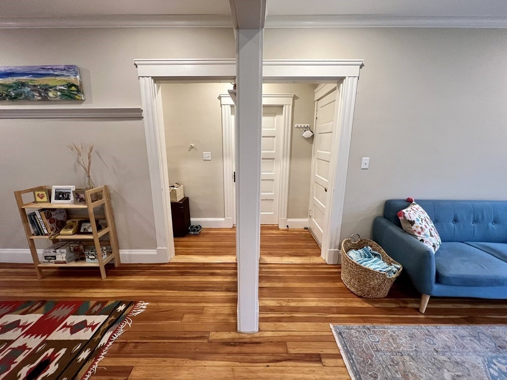 12 Rosemary Street, Unit 1 Boston, MA 02130 - Photo 5 of 17 a living room with furniture and a rug