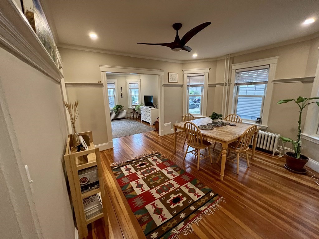 12 Rosemary Street, Unit 1 Boston, MA 02130 - Photo 6 of 17 a living room with furniture and a rug