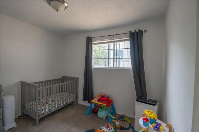 a room with toys and stairs