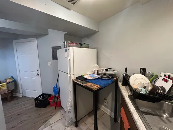 a room with furniture and gym equipment