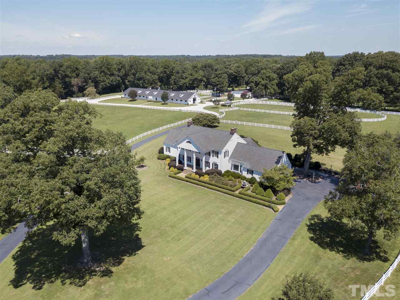 8446 Seven Paths Road Spring Hope, NC 27882 - Photo 1 of 24 a view of a swimming pool with a yard
