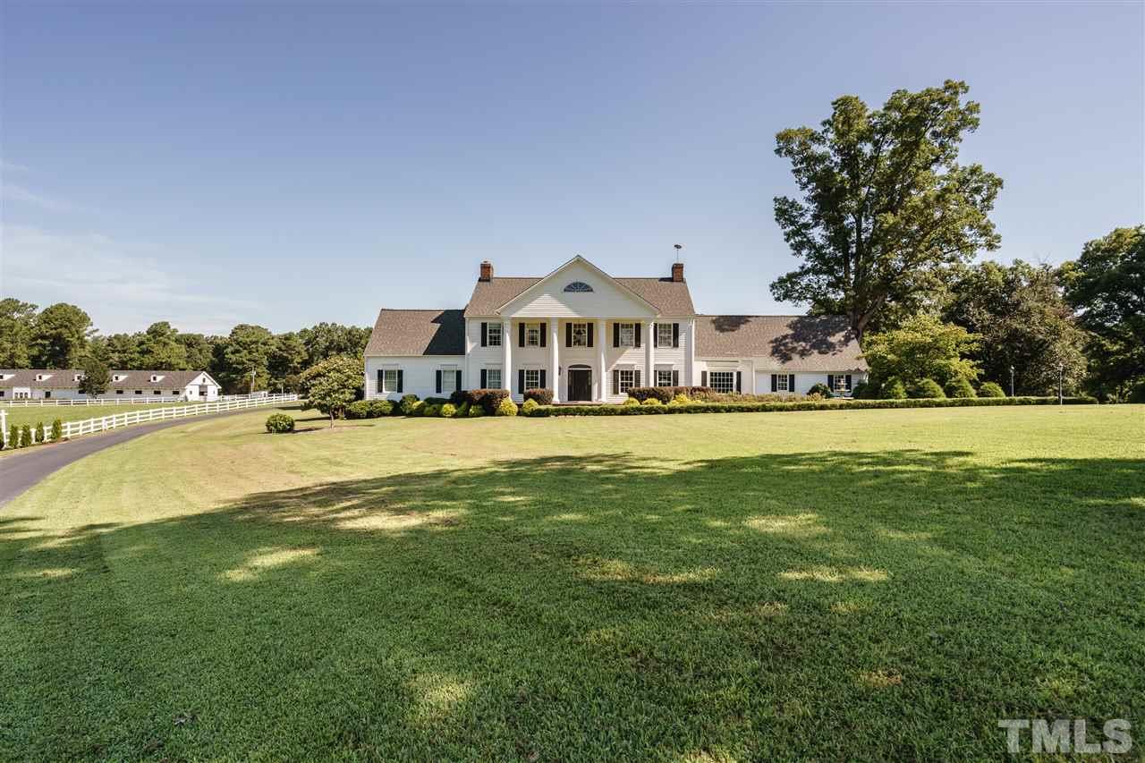 8446 Seven Paths Road Spring Hope, NC 27882 - Photo 2 of 24 a view of house with swimming pool