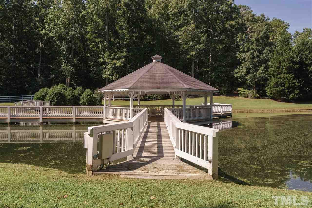 8446 Seven Paths Road Spring Hope, NC 27882 - Photo 23 of 24 a view of house with roof deck and furniture