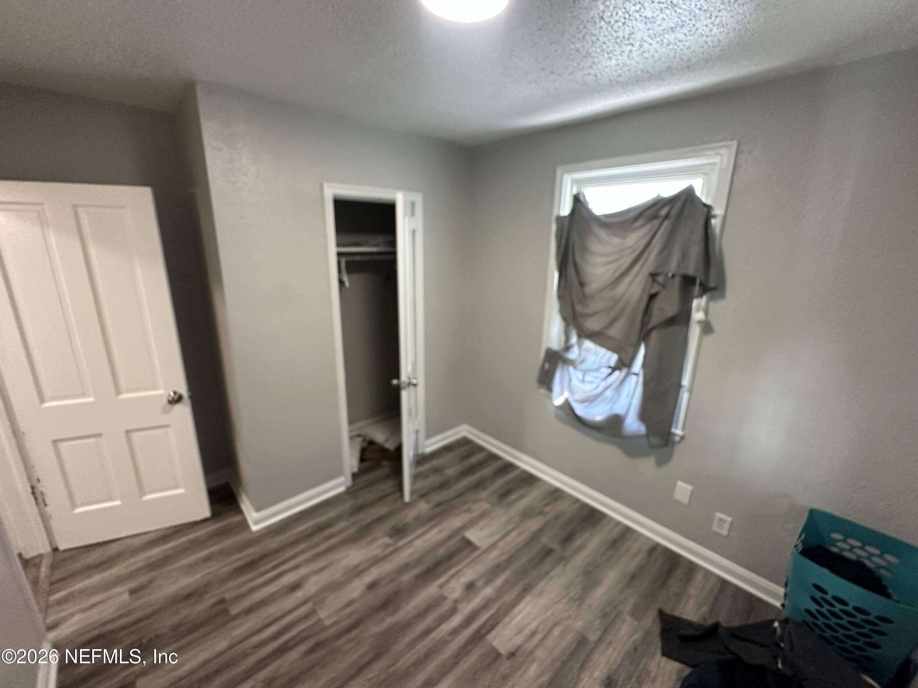 1804 Cleveland Street Jacksonville, FL 32209 - Photo 12 of 14 a view of a livingroom with wooden floor and stairs