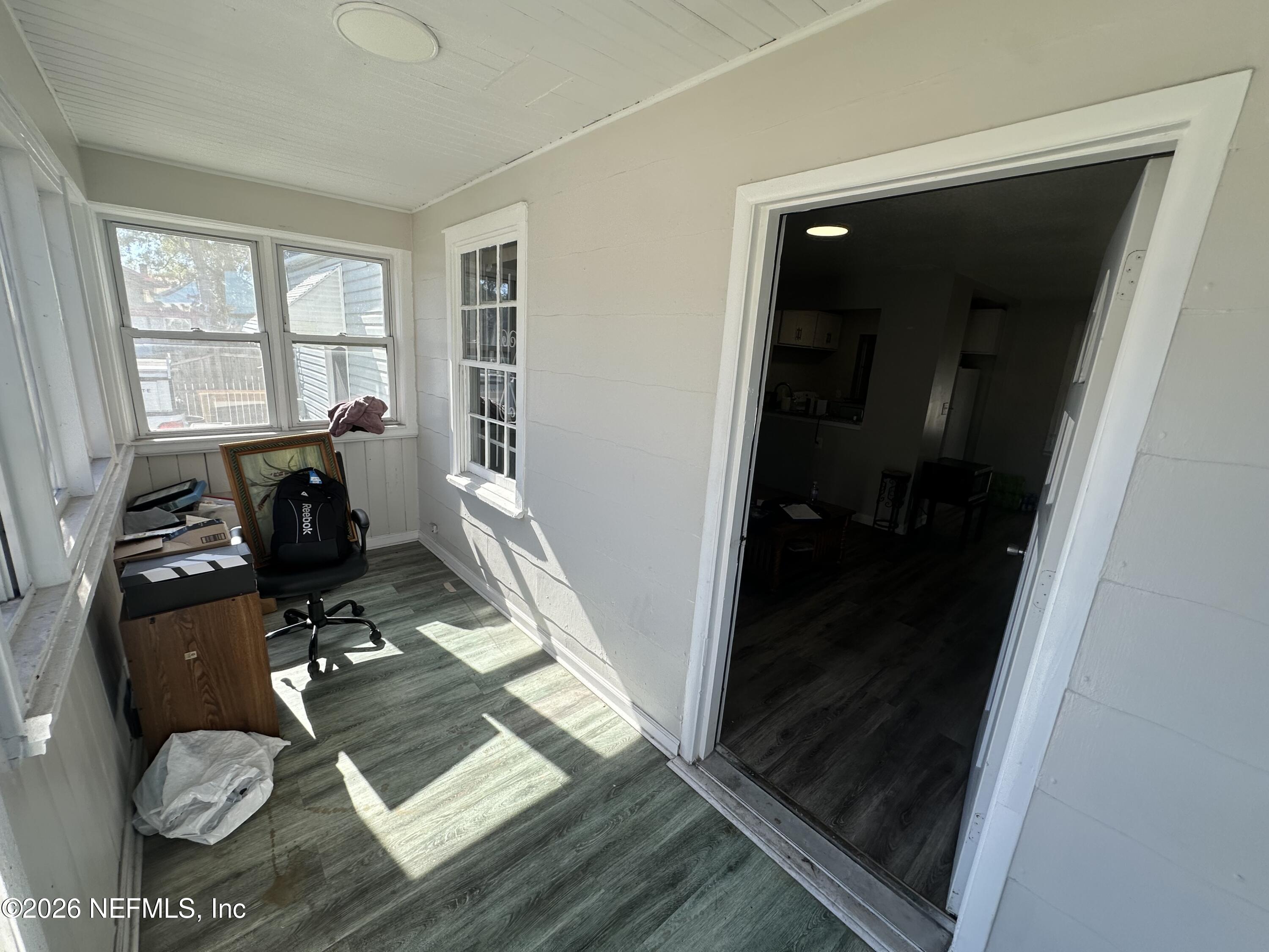 1804 Cleveland Street Jacksonville, FL 32209 - Photo 4 of 14 a living room with furniture and a window