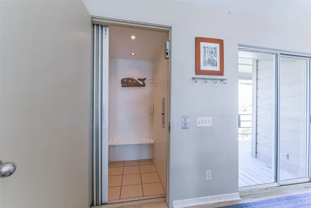 a view of railway station with wooden floor and fence