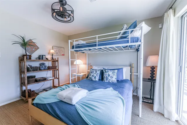 a bathroom with a sink toilet and a mirror