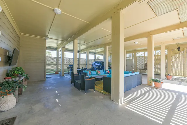 a view of a pathway with a garden