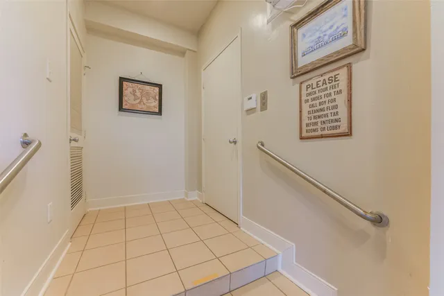 a view of an house with backyard and parking