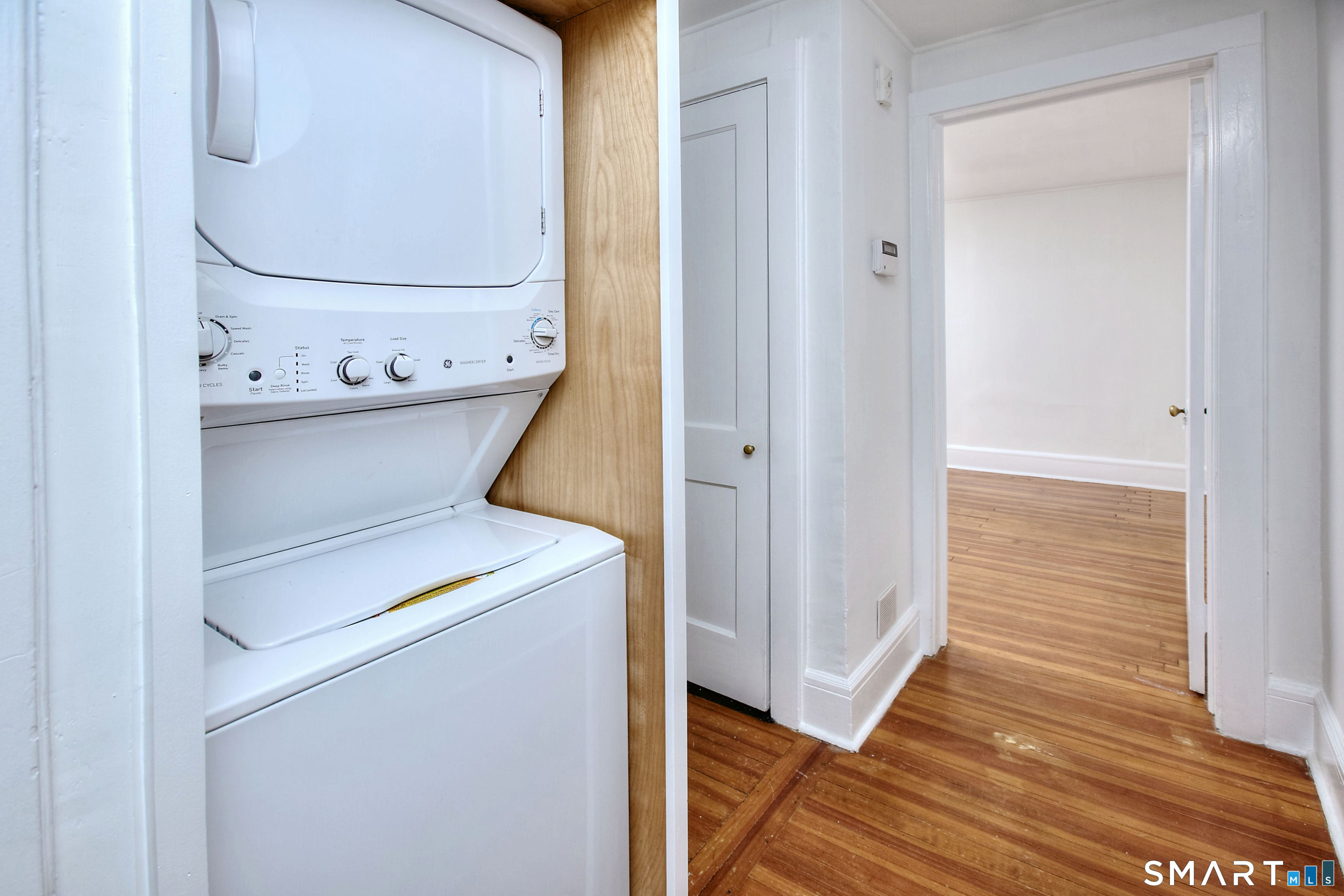94 Honey Hill Road Wilton, CT 06897 - Photo 10 of 18 a utility room with washer and dryer