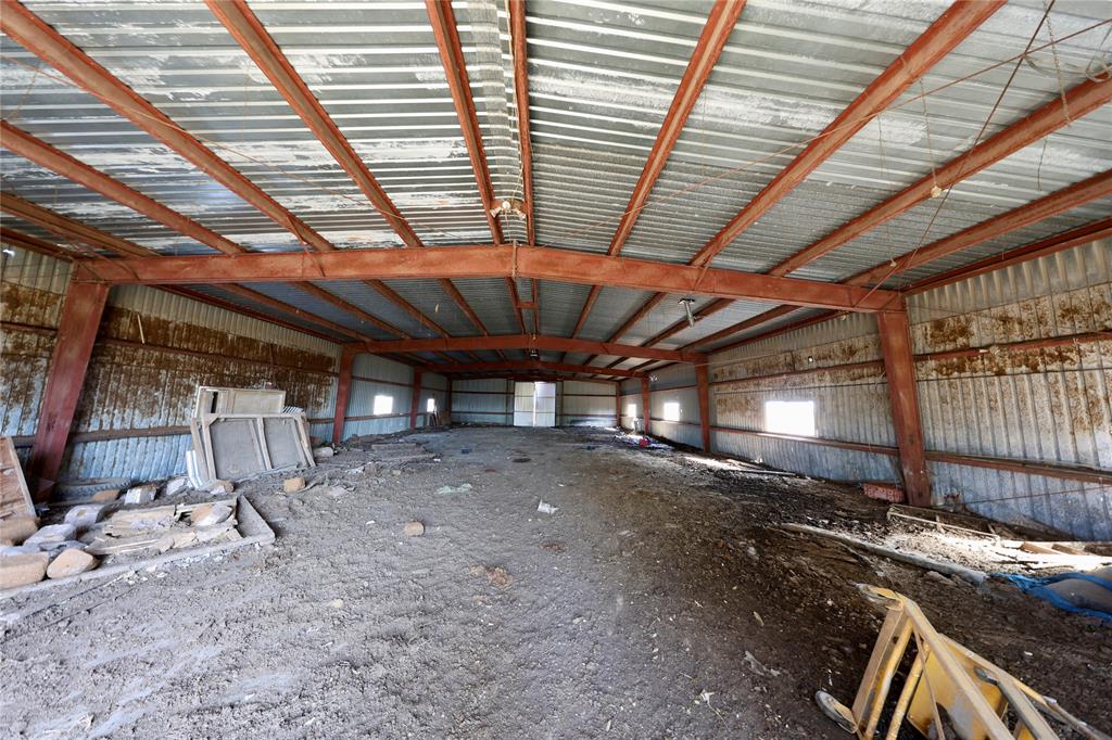 1600 County Road 1109A Rio Vista, TX 76093 - Photo 14 of 29 a view of a room with wooden ceiling