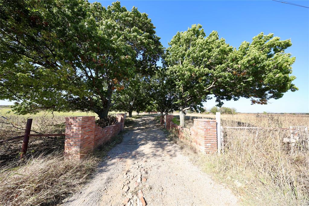 1600 County Road 1109A Rio Vista, TX 76093 - Photo 19 of 29 a view of yard covered with snow in the background