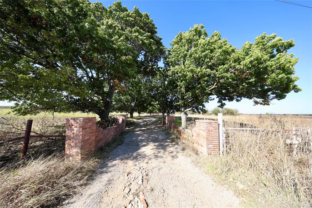 1600 County Road 1109A Rio Vista, TX 76093 - Photo 2 of 29 a view of yard covered with snow in the background