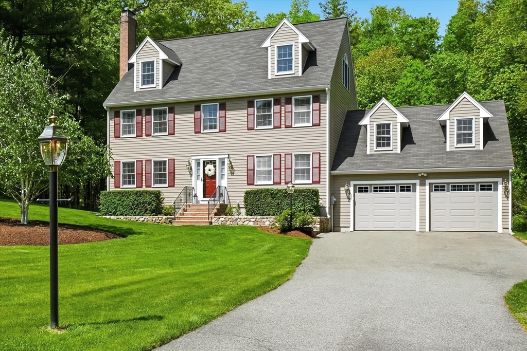 9 Fazio Farm Road Georgetown, MA 01833 - Photo 3 of 42 a front view of a house with a yard