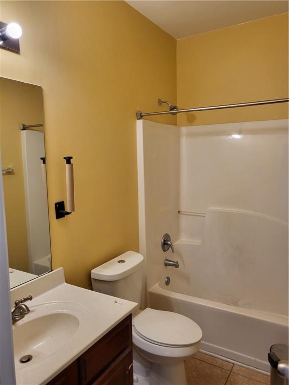 950 Rockbass Road Suwanee, GA 30024 - Photo 12 of 33 a bathroom with a sink a toilet and shower