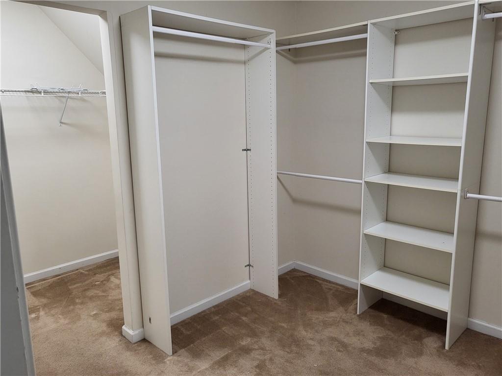 950 Rockbass Road Suwanee, GA 30024 - Photo 21 of 33 a view of an empty walk in closet