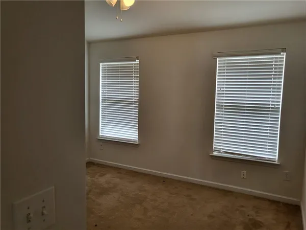 a view of a room that has a window in it