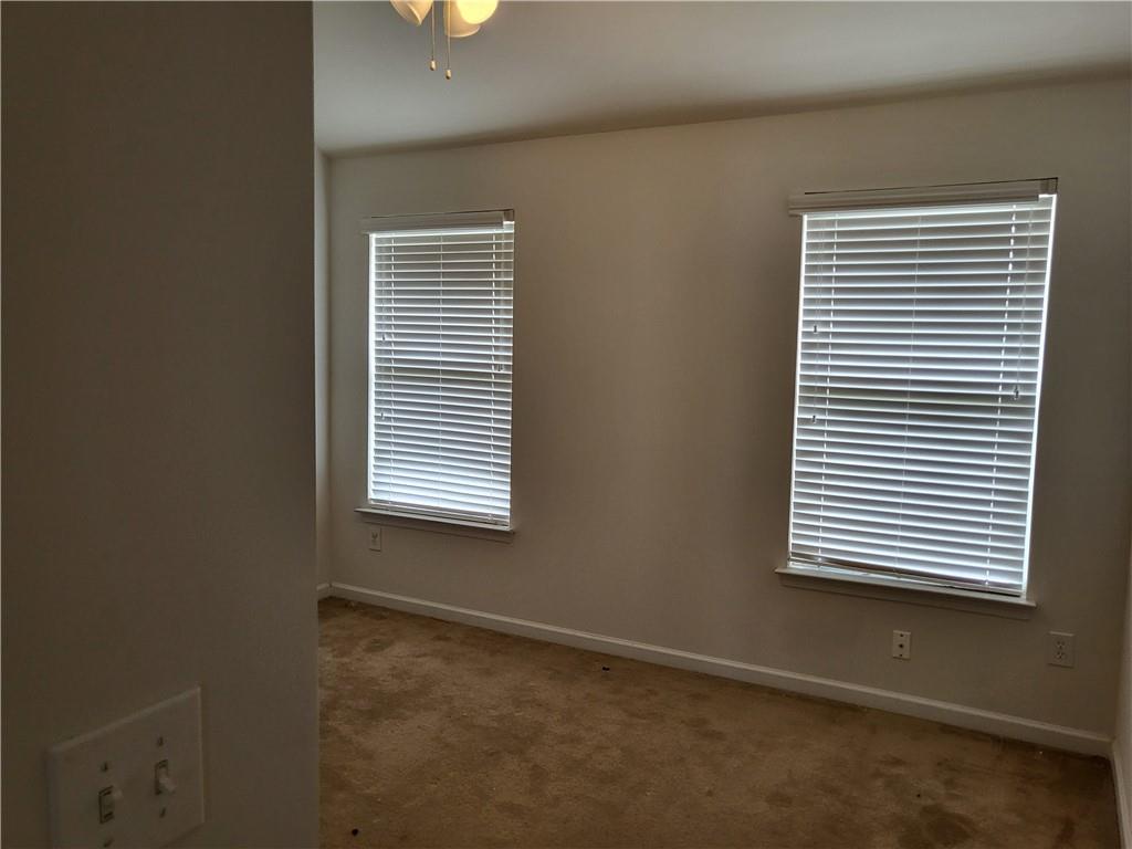 950 Rockbass Road Suwanee, GA 30024 - Photo 25 of 33 a view of a room that has a window in it