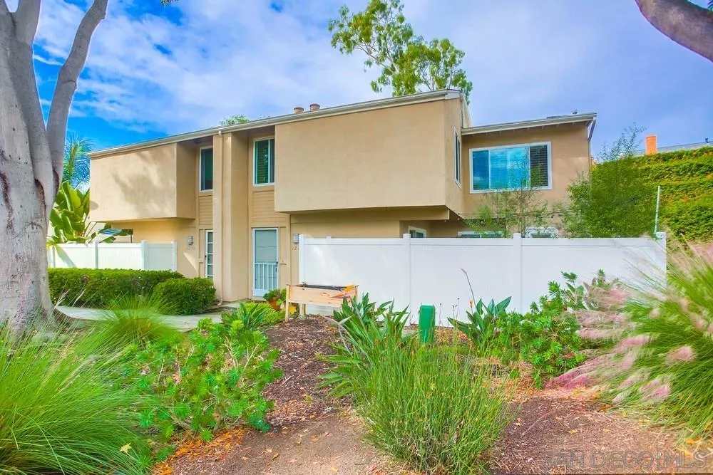 1228 Evergreen Drive Cardiff, CA 92007 - Photo 1 of 37 a front view of a house with garden