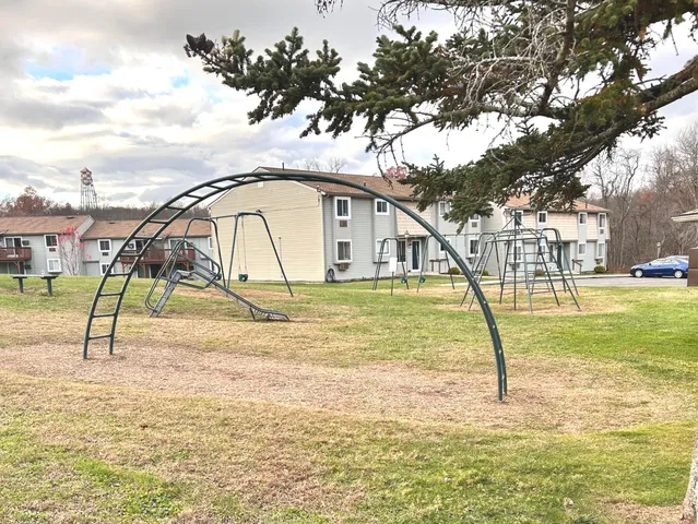 a view of a house with a park