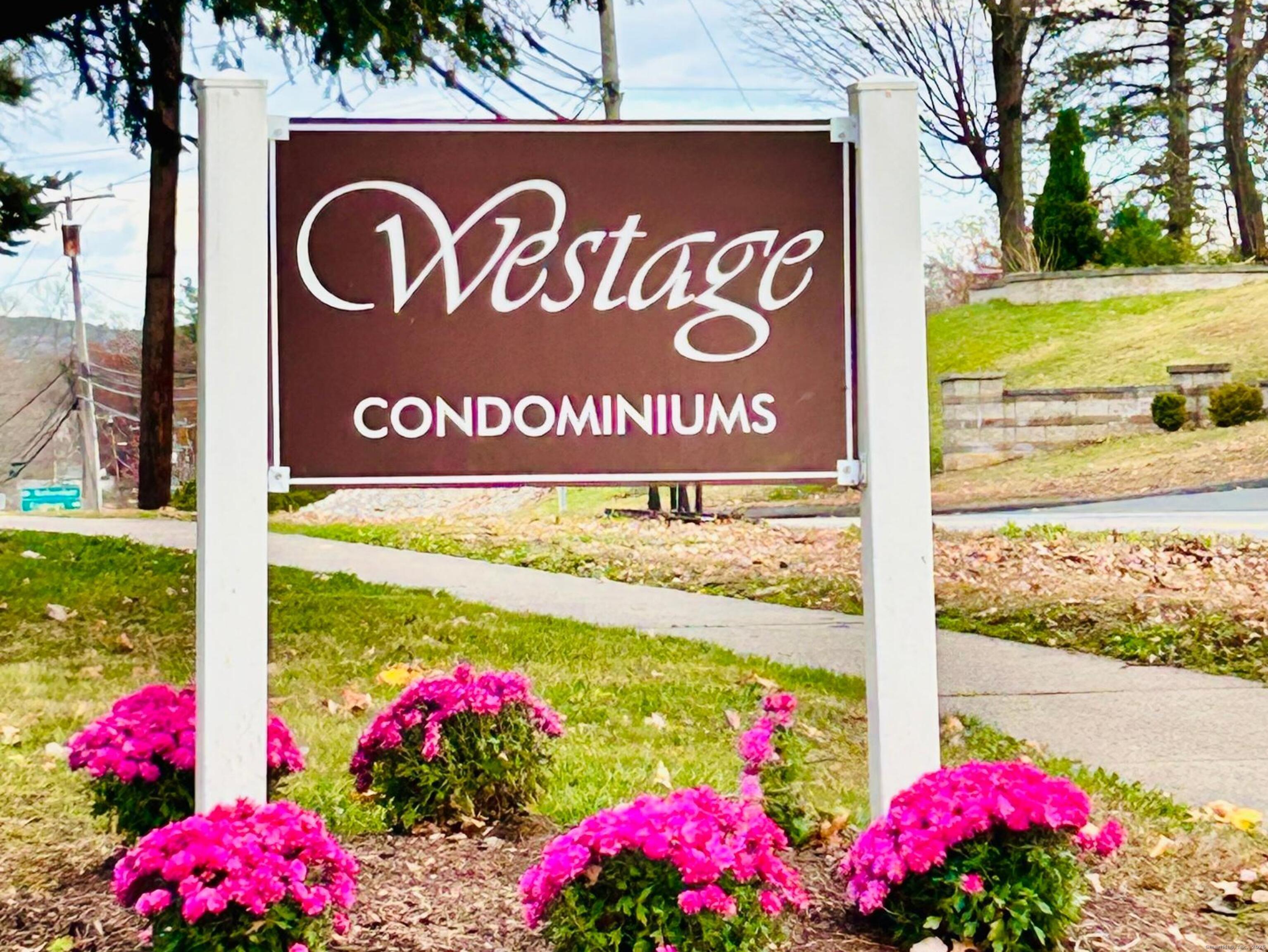 4 Carillon Drive, Unit B Rocky Hill, CT 06067 - Photo 2 of 16 a view of sign board