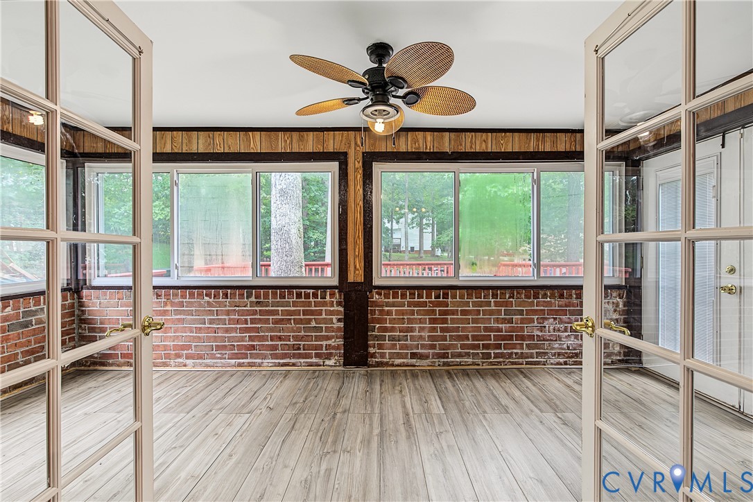 13310 Gladehill Road Chester, VA 23831 - Photo 24 of 41 Sunroom featuring light wood-finish flooring, expo