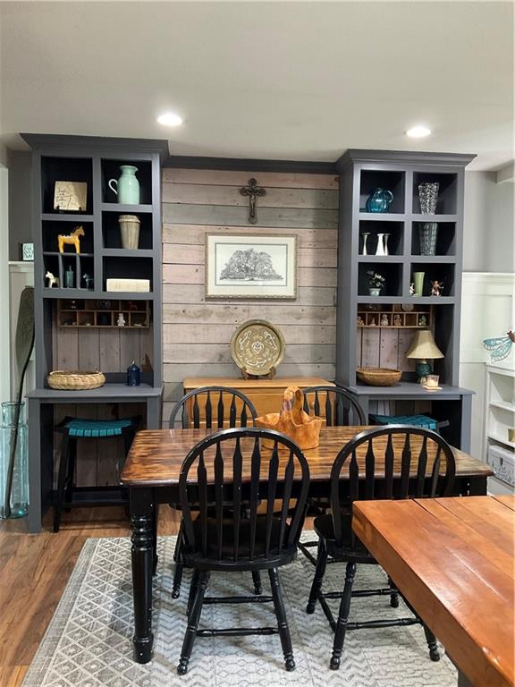 5403 Stone Trace Gainesville, GA 30504 - Photo 23 of 126 a view of a dining room with furniture and wooden floor