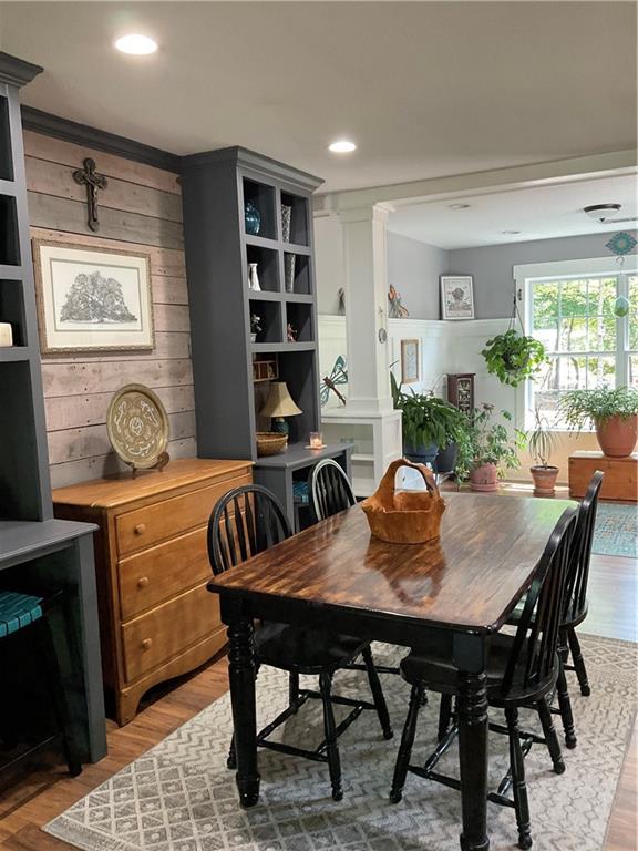 5403 Stone Trace Gainesville, GA 30504 - Photo 25 of 126 a view of a dining room and livingroom with furniture window and wooden floor