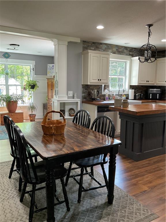 5403 Stone Trace Gainesville, GA 30504 - Photo 34 of 126 a view of a dining room with furniture window and wooden floor