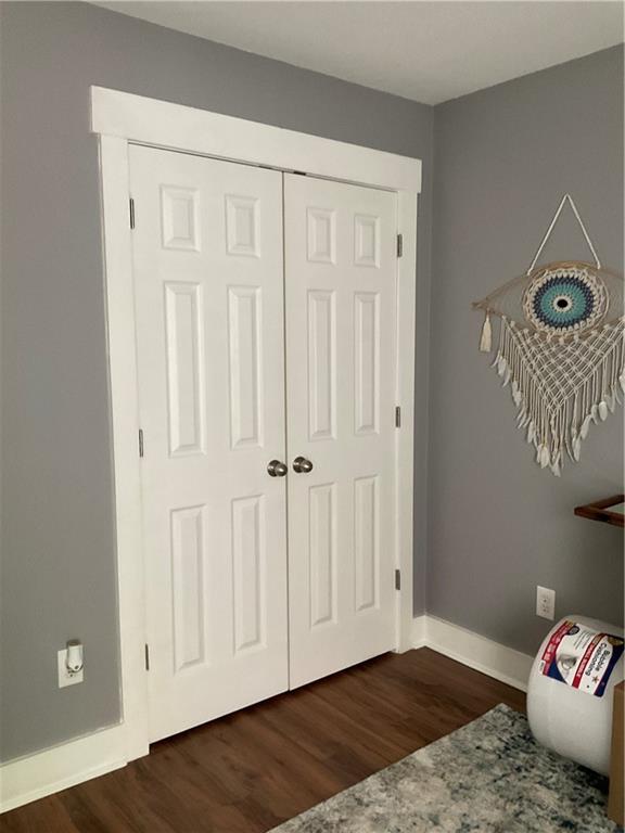 5403 Stone Trace Gainesville, GA 30504 - Photo 88 of 126 a view of an empty room with wooden floor and closet