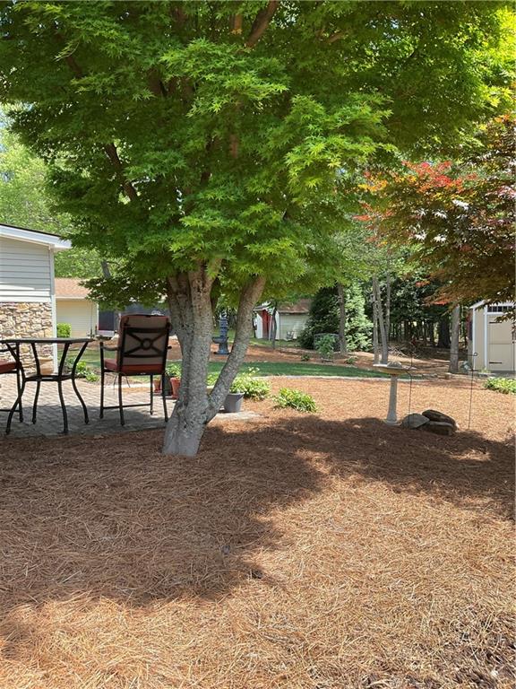 5403 Stone Trace Gainesville, GA 30504 - Photo 93 of 126 a view of swimming pool with a patio
