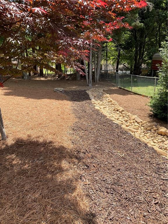 5403 Stone Trace Gainesville, GA 30504 - Photo 96 of 126 a view of a yard with a house