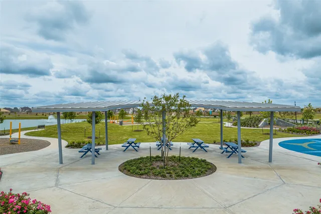a view of a swimming pool with a lounge chairs
