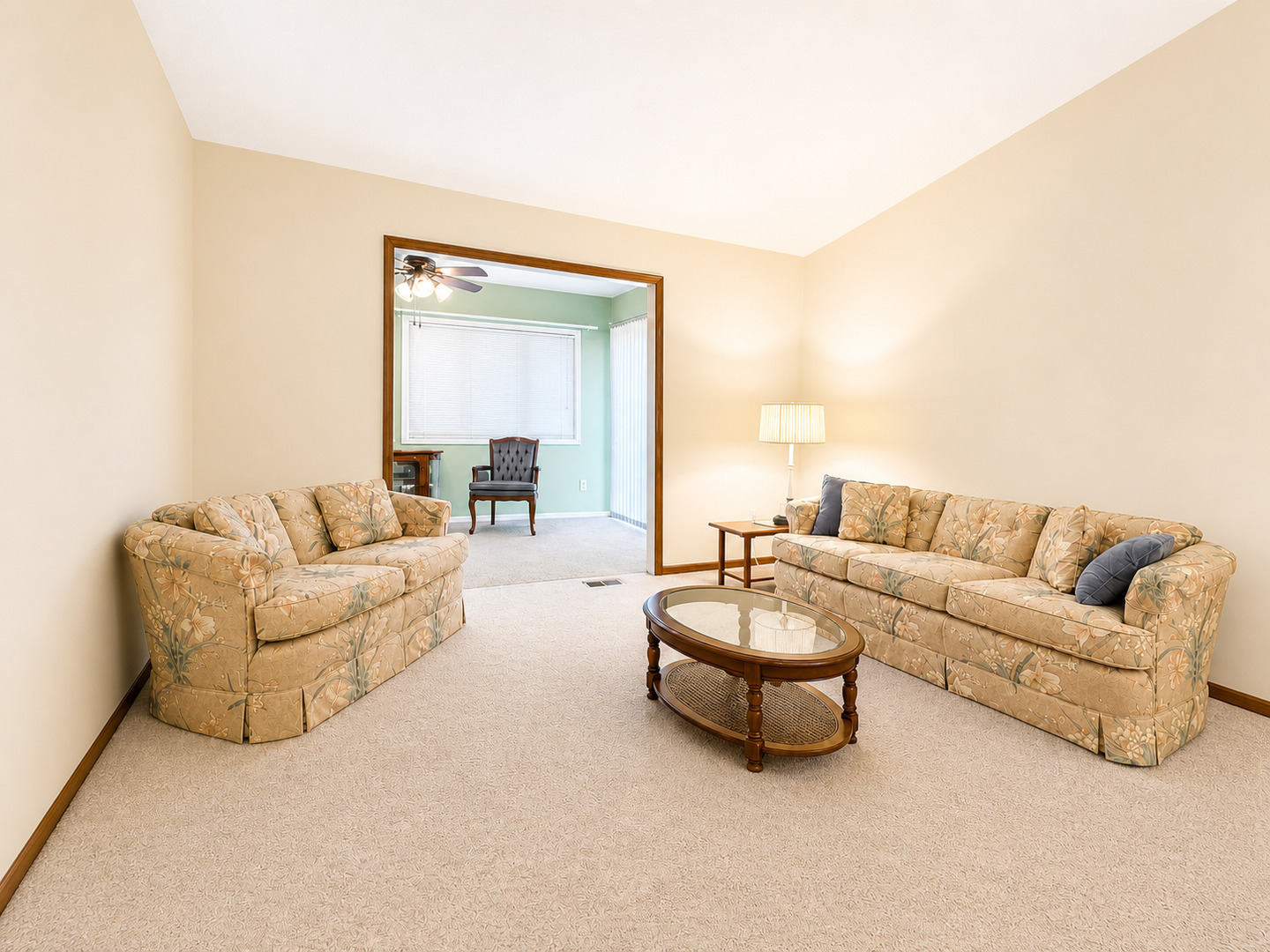 2608 38th Street Moline, IL 61265 - Photo 11 of 18 a living room with furniture and a large mirror